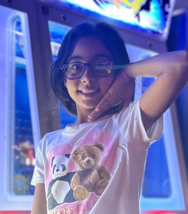 Rosie having fun at the arcade