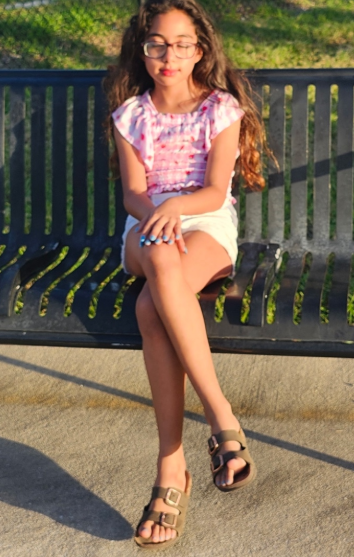 Rosie smiling outdoors
